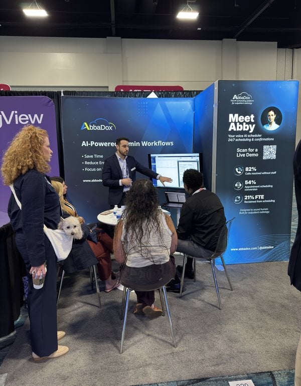 An AbbaDox specialist walking visitors through a live demo at the stand at AHRA 2026 in Orlando