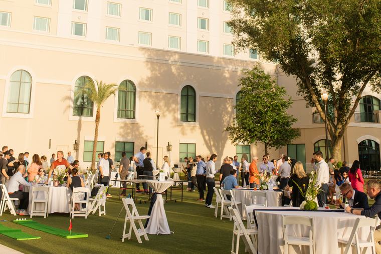 The evening reception on the resort lawn at RBMA PaRADigm 2026 in ChampionsGate, Florida