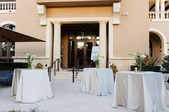 Cocktail tables set out along the loggia before the Orlando dinner