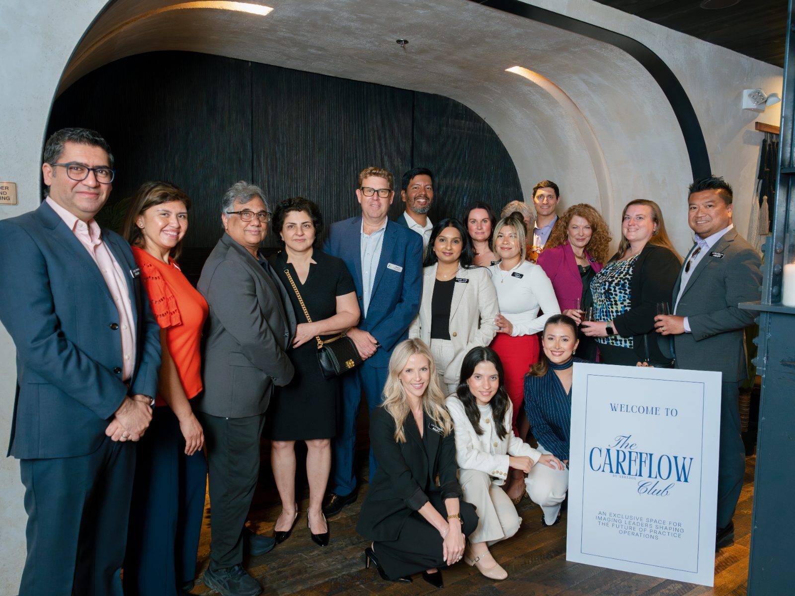 The Washington DC chapter gathered beside the CareFlow Club welcome sign