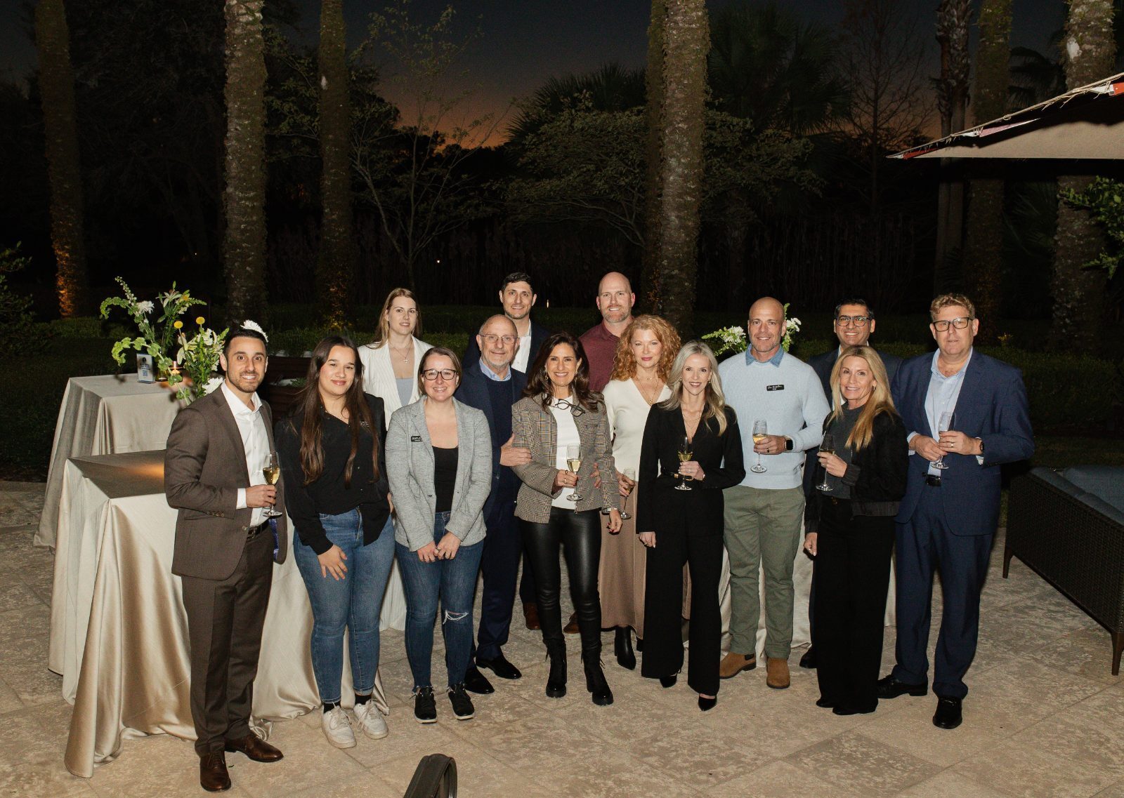 The Orlando chapter together on the terrace at dusk